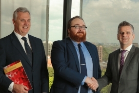 Professor Mark Hoffman, Dean of UNSW Engineering, Professor Travis Waller from the Research Centre for Integrated Transport Innovation and Steve Porter, Advisian's Managing Director, Asia Pacific.